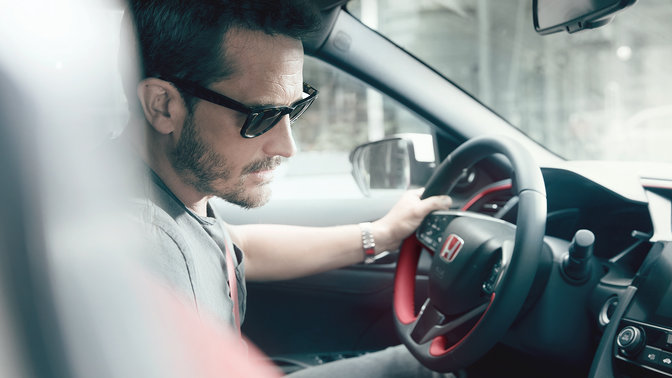 Model using Honda Civic Type R voice recognition system.