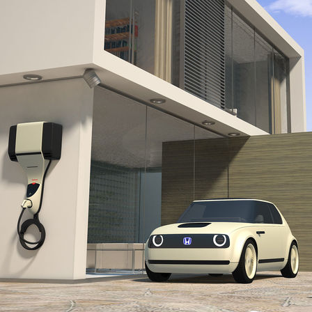 3/4-Frontansicht des Honda Urban EV Concept mit Ladepunkt.