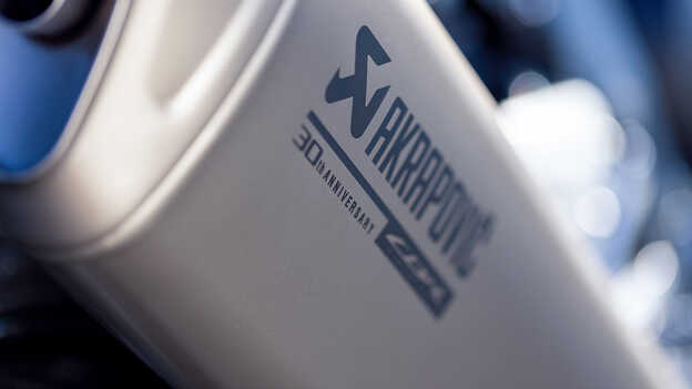 Close-up of the Honda CBR1000RR-R Fireblade's engraved Akrapovic muffler